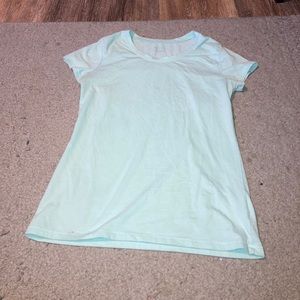 Light blue shirt sleeve tee.